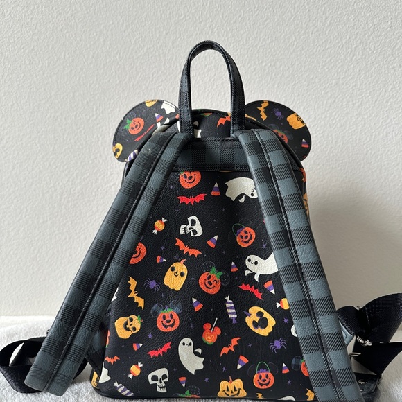disney halloween loungefly mini backpack EXCLUSIVE DROP: Parks Mickey Mouse & Friends Haunted House Joe Journeyman is a Look Disney: Glow Face Pumpkin Minnie
